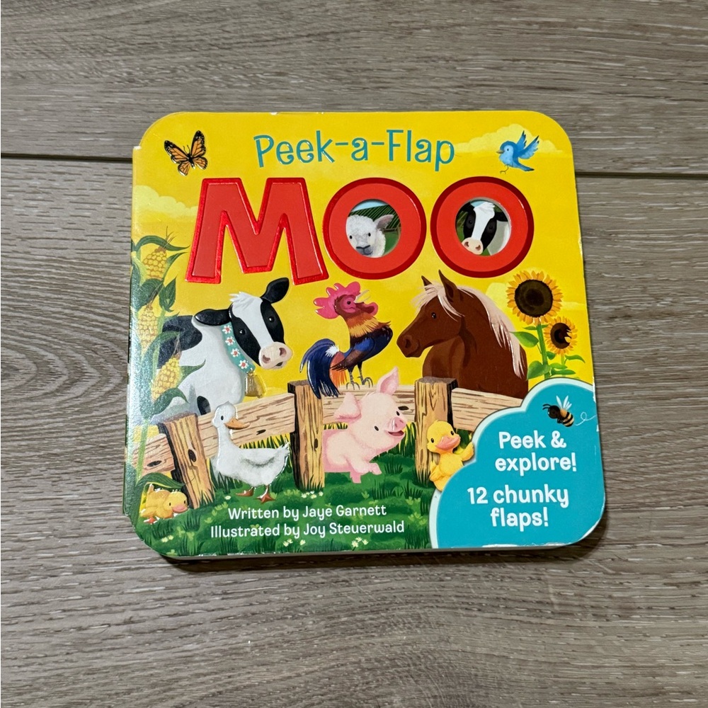 Toddler board book peek a flap Moo